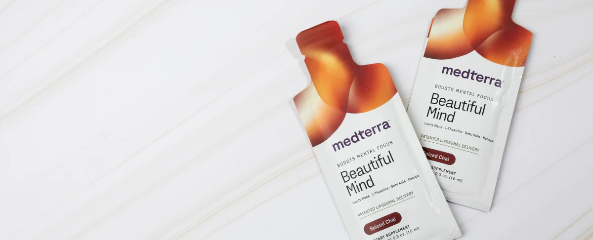 Two packets of Beautiful Mind supplement by Medterra, featuring a sleek design and the text 'Beautiful Mind' prominently displayed.