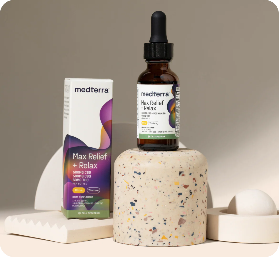 Front view of Medterra Max Relief + Relax tincture bottle and box showing 500mg CBD/500mg CBG on neutral backdrop