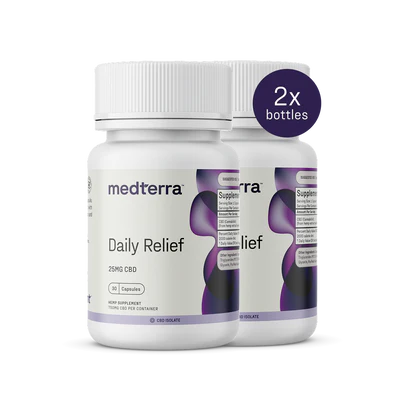 Two bottles of Medterra's Daily Relief CBD Isolate Capsules, featuring 25mg per serving. The white label with purple and black accents emphasizes "THC-free" and "on-the-go relief," with a circular badge noting "2x bottles.