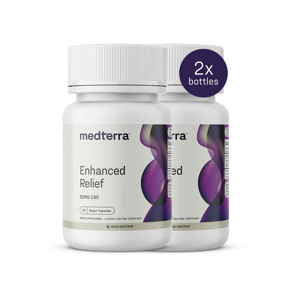 Front view of two Medterra Enhanced Relief Broad Spectrum bottles showing 50mg CBD, Vegan Capsules badge, and 2x bottles overlay on white background