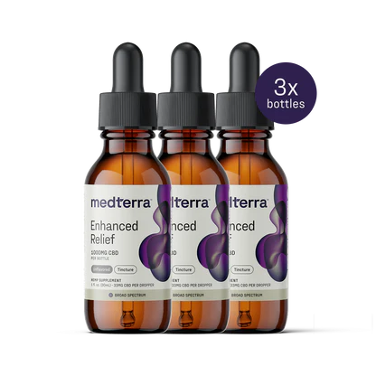 Three bottles of Medterra's Enhanced Relief Broad Spectrum CBD Oil are shown against a white background. Each amber bottle has a black dropper cap, and the purple label includes a circular "3x bottles" badge.