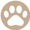 A beige paw print icon with four toes and a pad in the center, set against a circular white background, representing the highest quality craftsmanship.