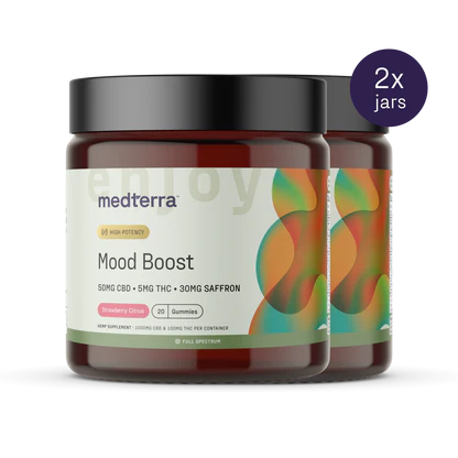 Front view of two Mood Boost Gummies jars showcasing label with 50mg CBD, 5mg THC and 30mg saffron, strawberry citrus flavor and a purple 2x jars badge on white background